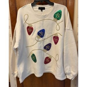 State of Mind White Sweatshirt with Colorful Holiday Bulb decorations